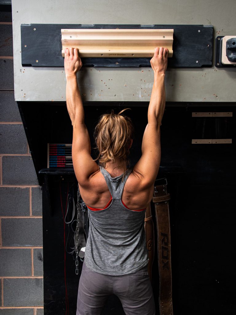 A woman using the fingerboard