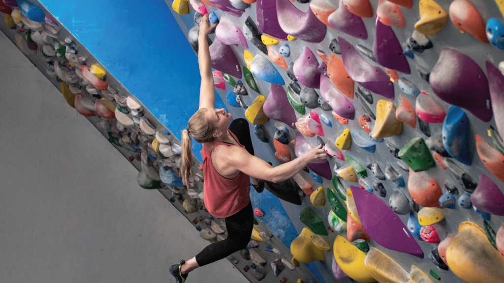 Jen Wood climbign on a splatter board