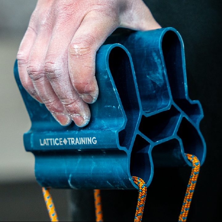 Climber training pinch strength on the Quad Block