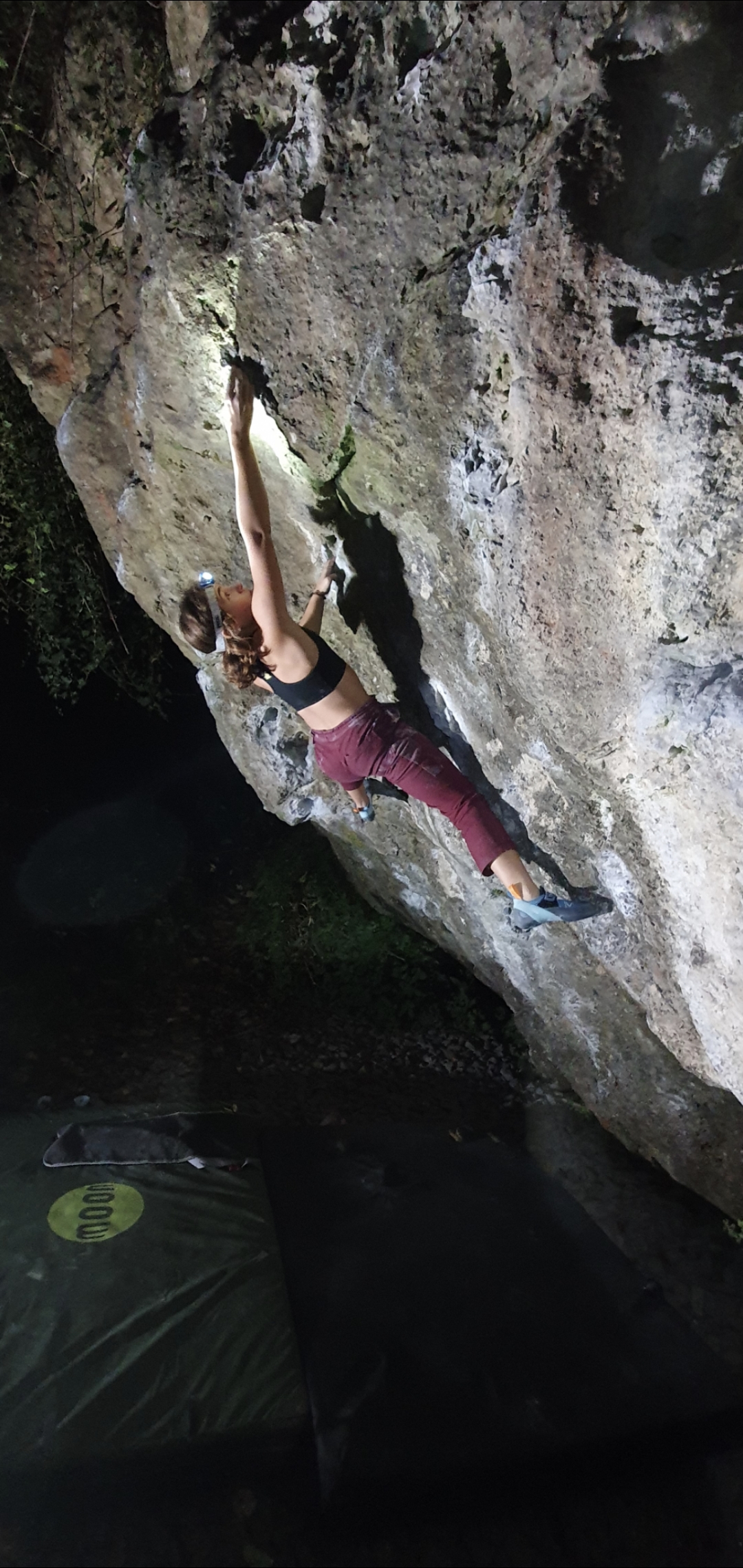 Teresa bouldering by lamp