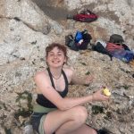 Darcey, ambassador on a crag