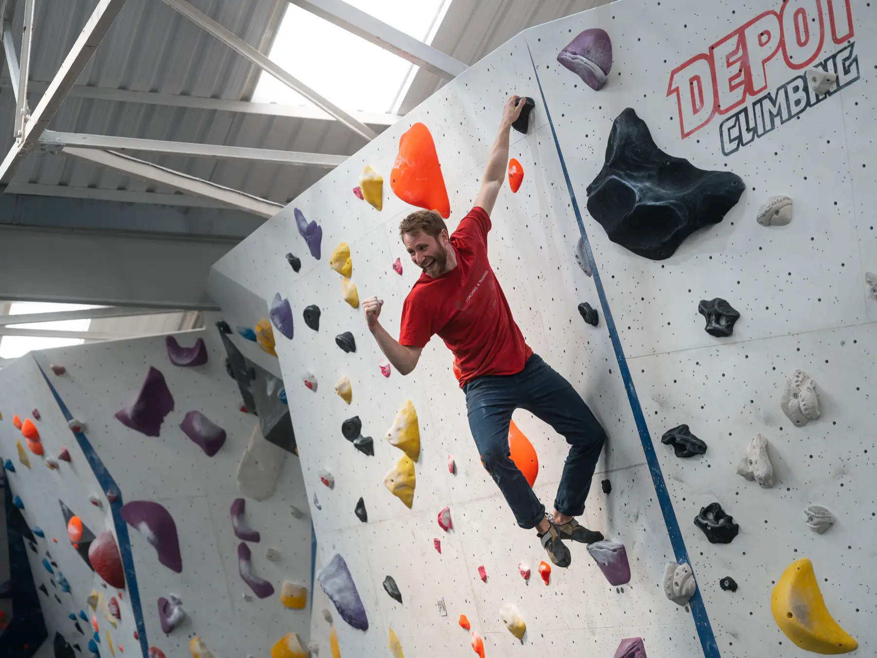 Climber celebrating at Depot Climbing gym